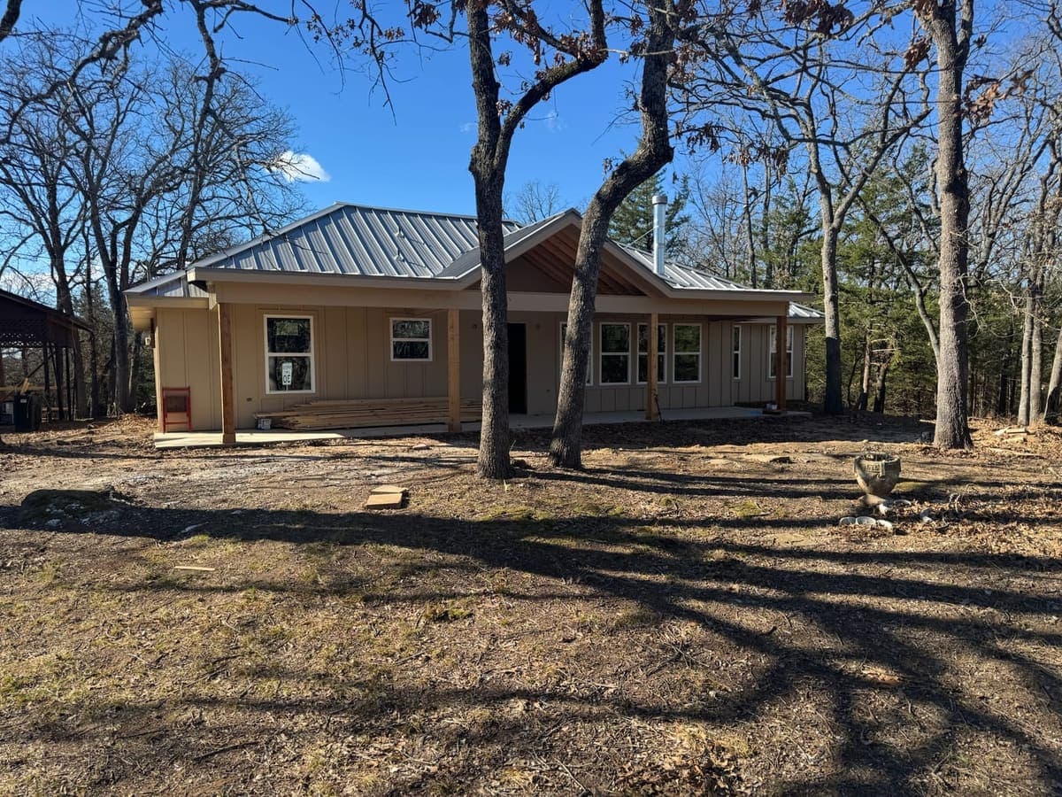 Timpanaro home after remodel — modern farmhouse with metal roof